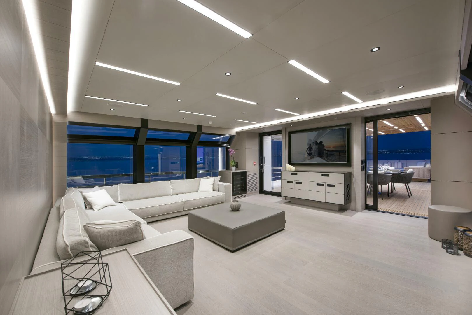 a room with a couch and a tv aboard PICCOLO Yacht for Sale