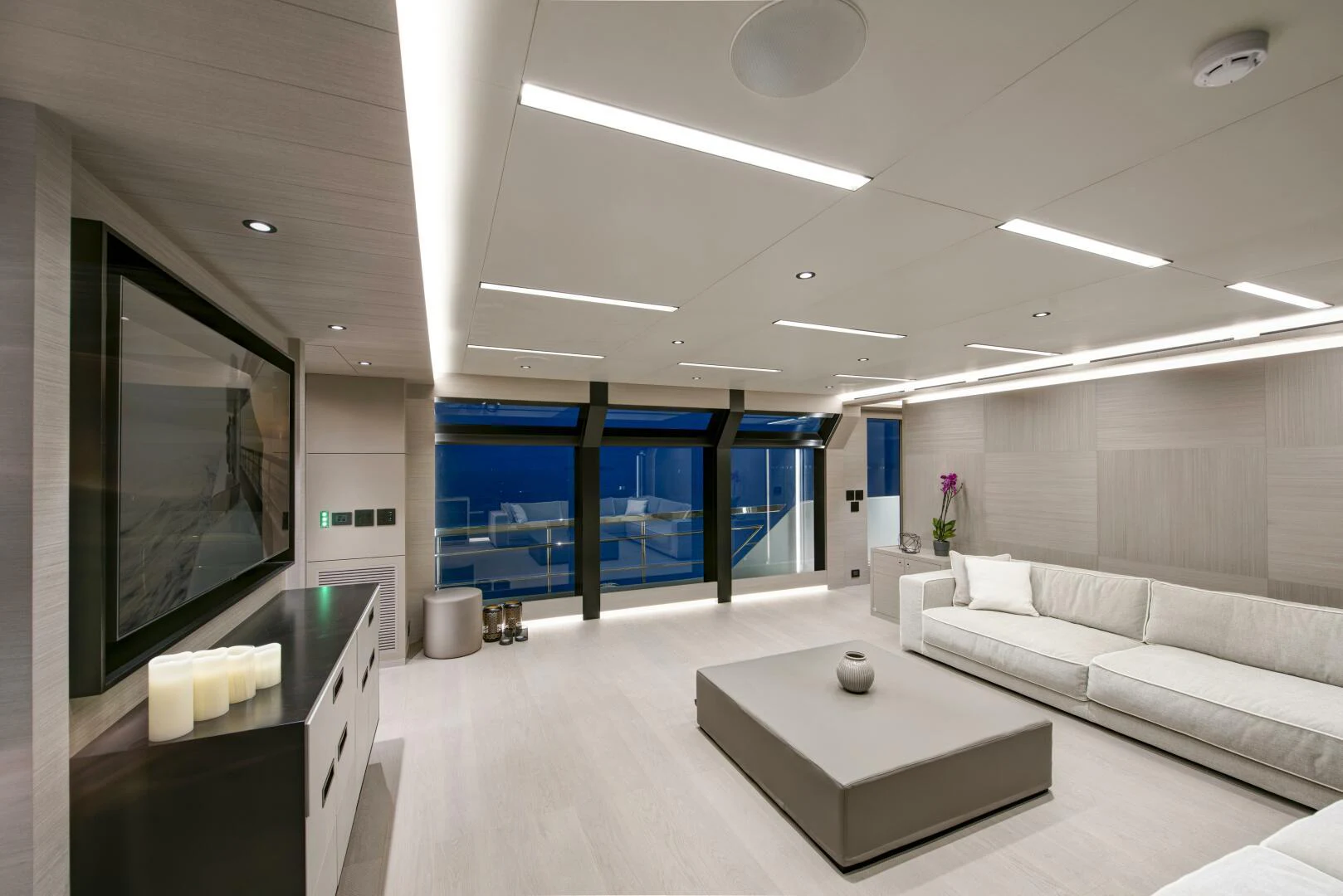 a room with a couch and a tv aboard PICCOLO Yacht for Sale