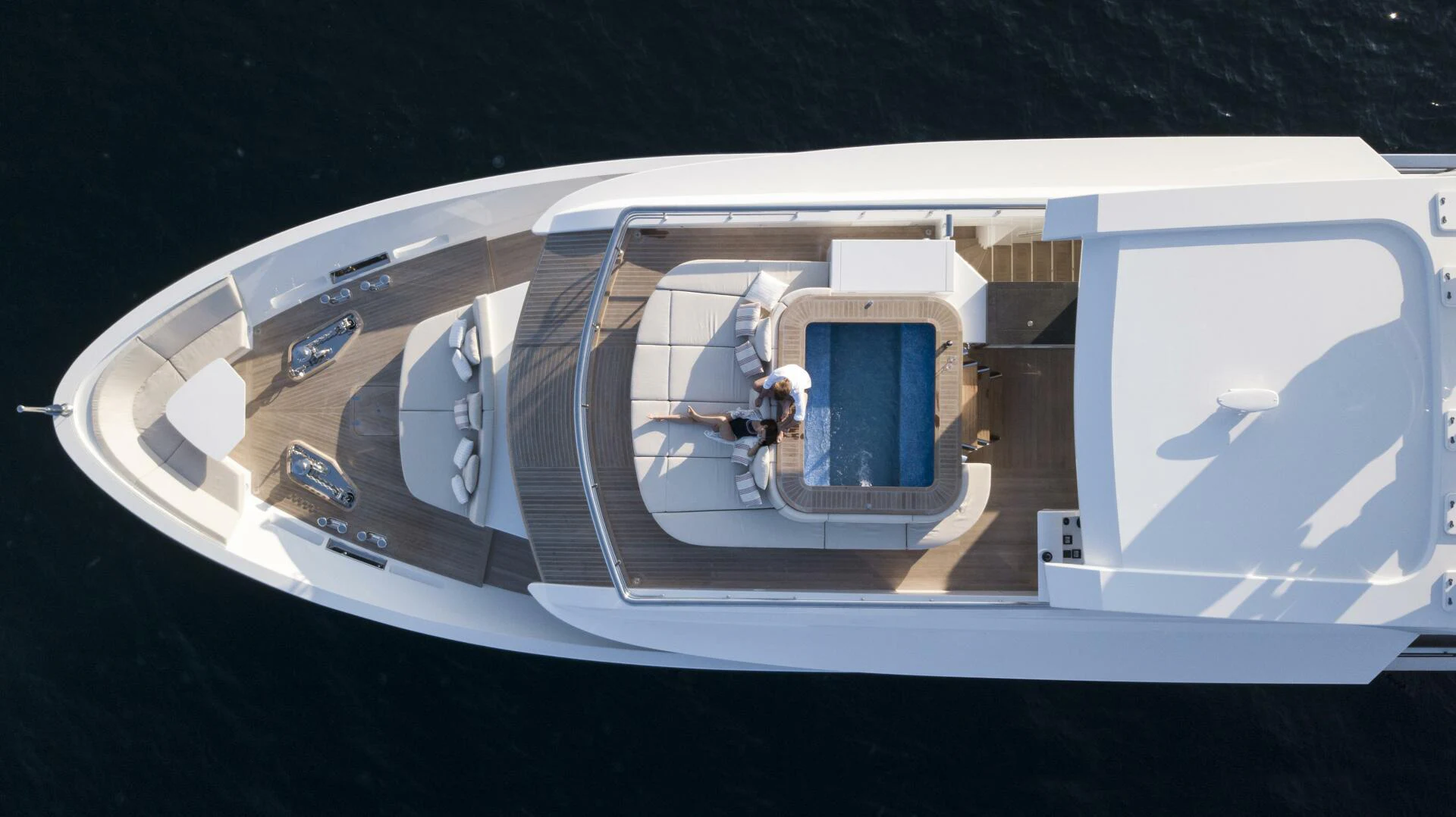 a person sitting in a chair on a plane aboard PICCOLO Yacht for Sale