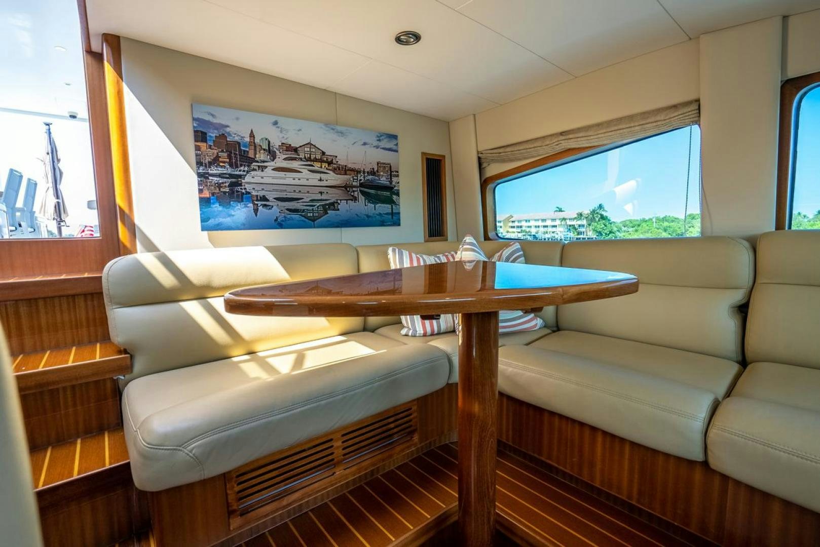 a living room with a couch and a table aboard AMERICAN HONEY Yacht for Sale