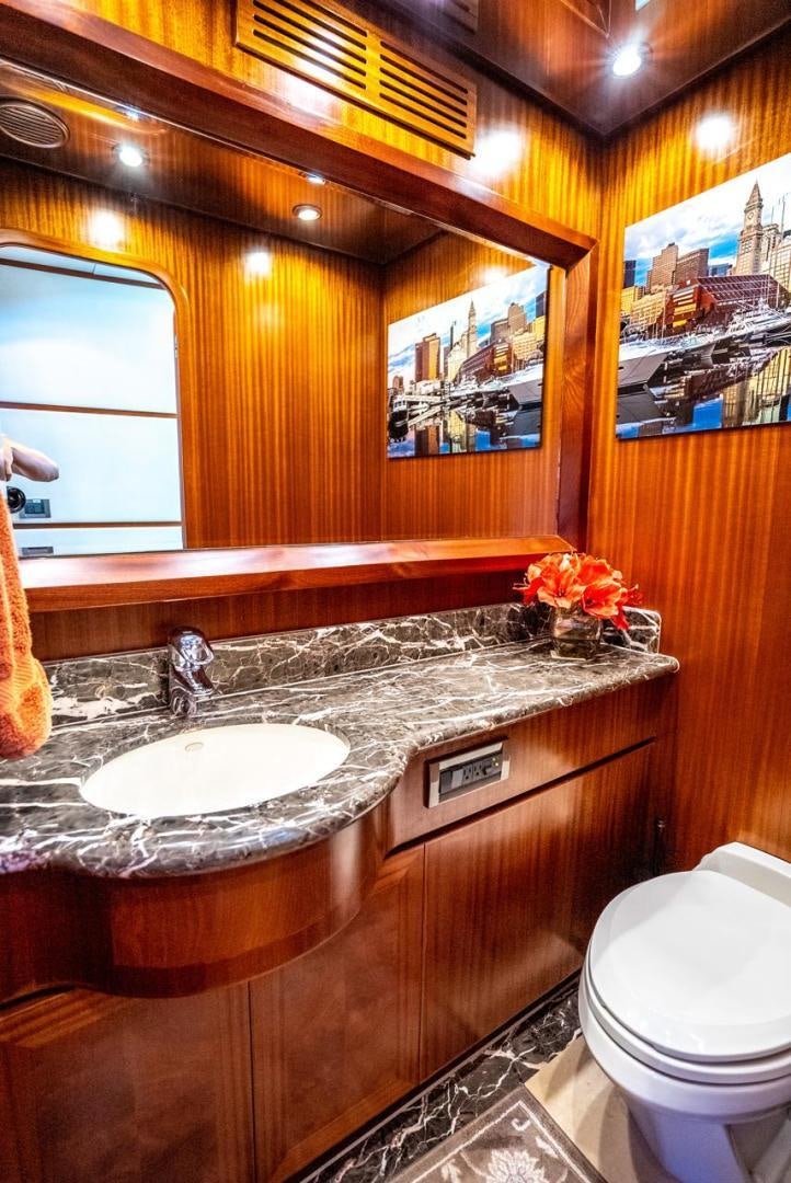 a bathroom with a sink and toilet aboard AMERICAN HONEY Yacht for Sale