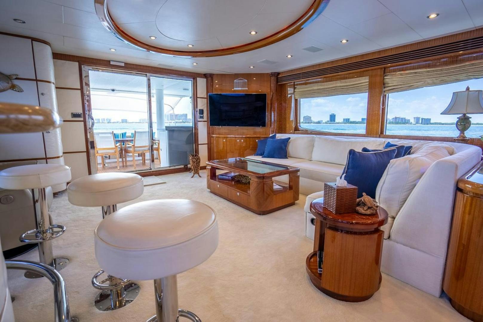 a living room with a couch and a coffee table aboard AMERICAN HONEY Yacht for Sale