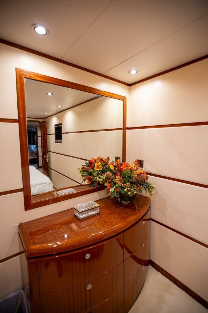 a mirror above a dresser aboard AMERICAN HONEY Yacht for Sale