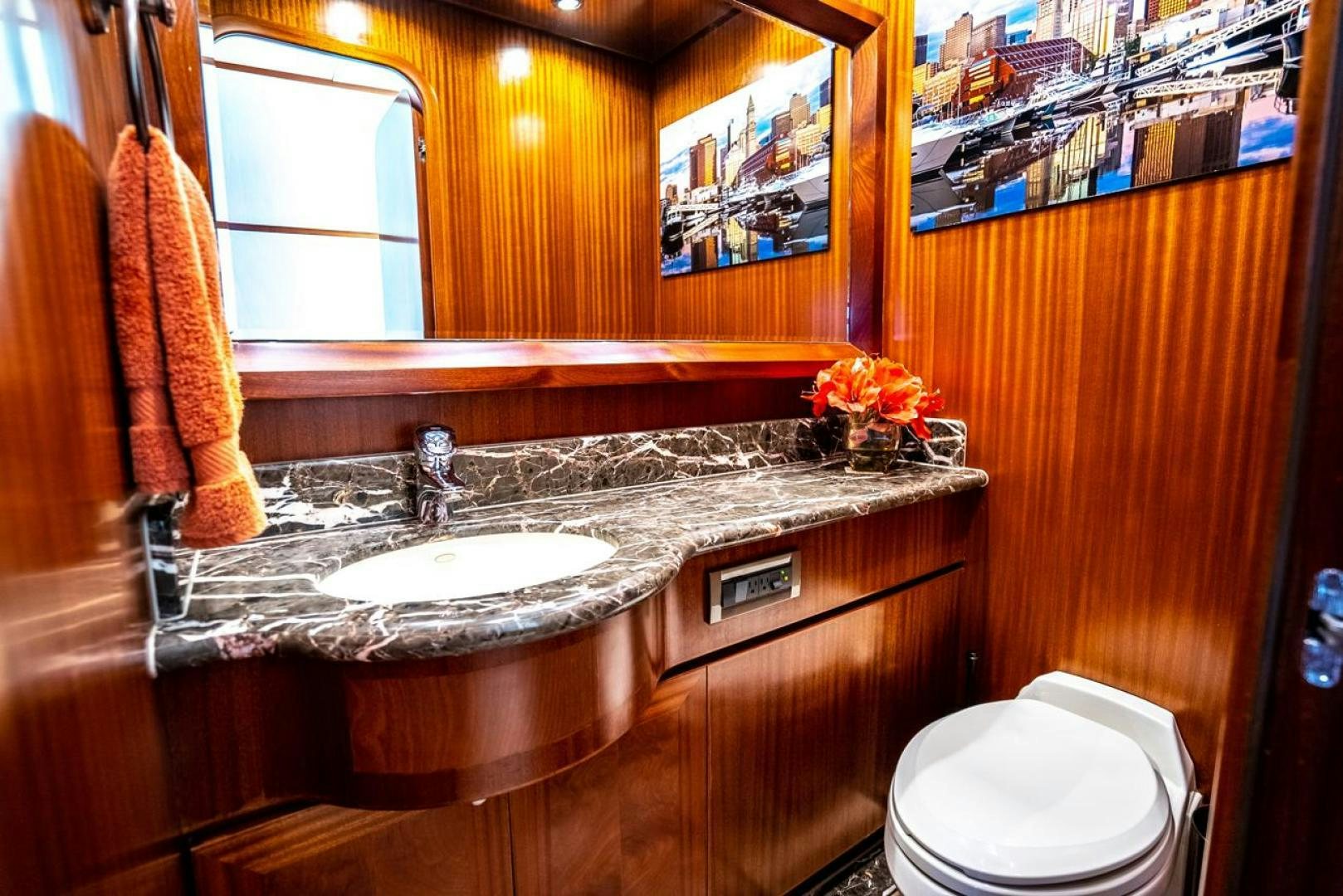 a bathroom with a sink and toilet aboard AMERICAN HONEY Yacht for Sale