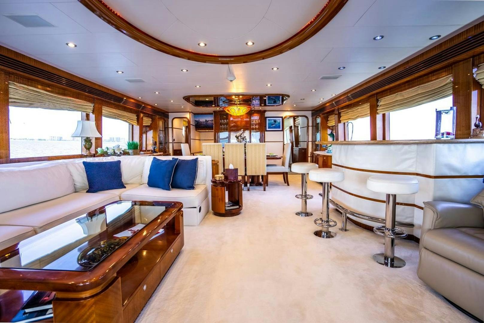 a living room with a couch and a table aboard AMERICAN HONEY Yacht for Sale