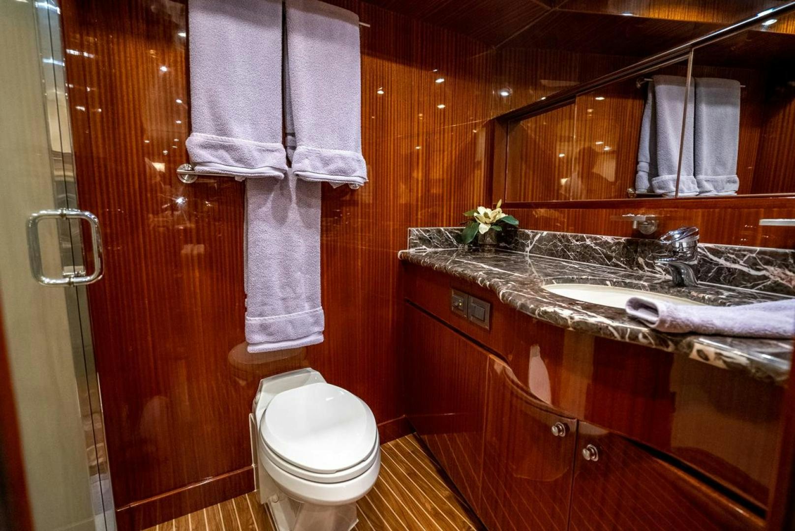 a bathroom with a sink and toilet aboard AMERICAN HONEY Yacht for Sale