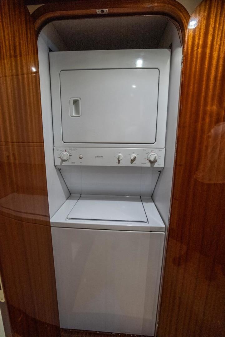 a white washing machine aboard AMERICAN HONEY Yacht for Sale