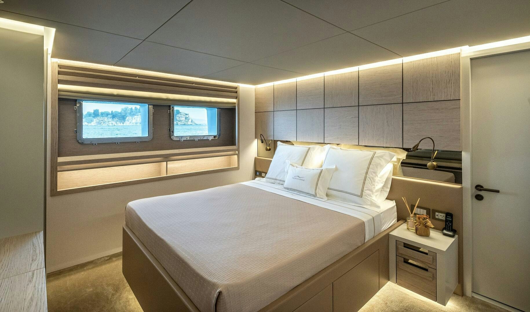 a room with two beds aboard 37XP 08 ROCKIT Yacht for Sale