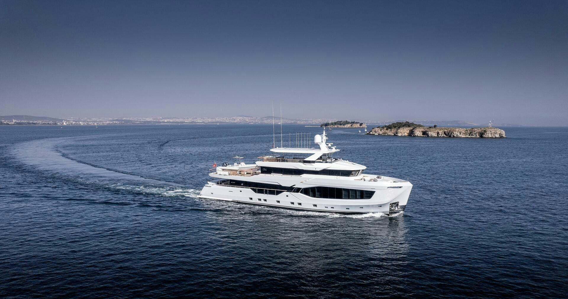 a white boat on the water aboard 37XP 08 ROCKIT Yacht for Sale