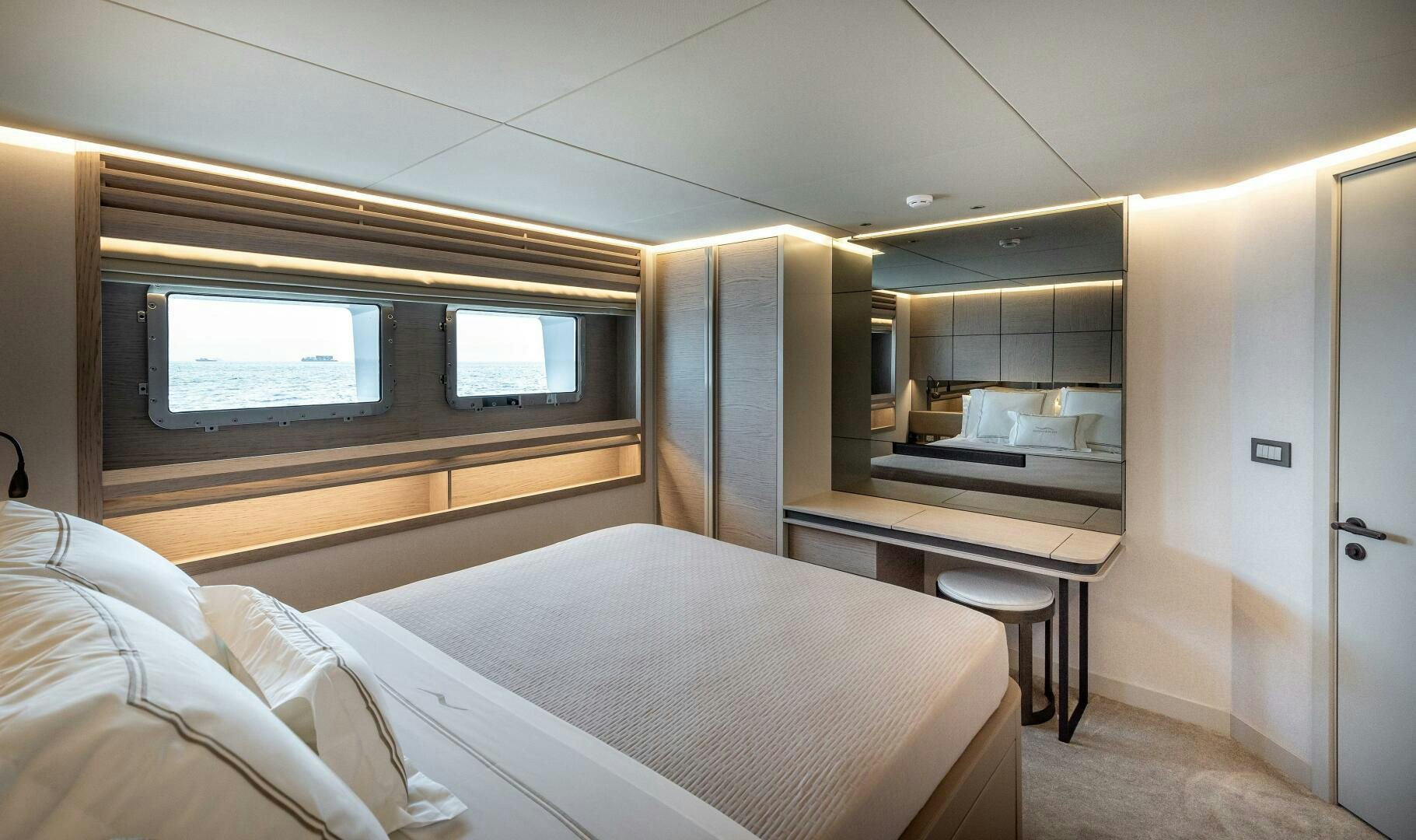 a room with a bed and a desk aboard 37XP 08 ROCKIT Yacht for Sale