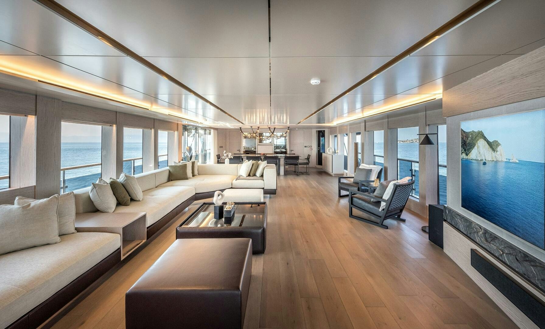 a living room with a large screen aboard 37XP 08 ROCKIT Yacht for Sale