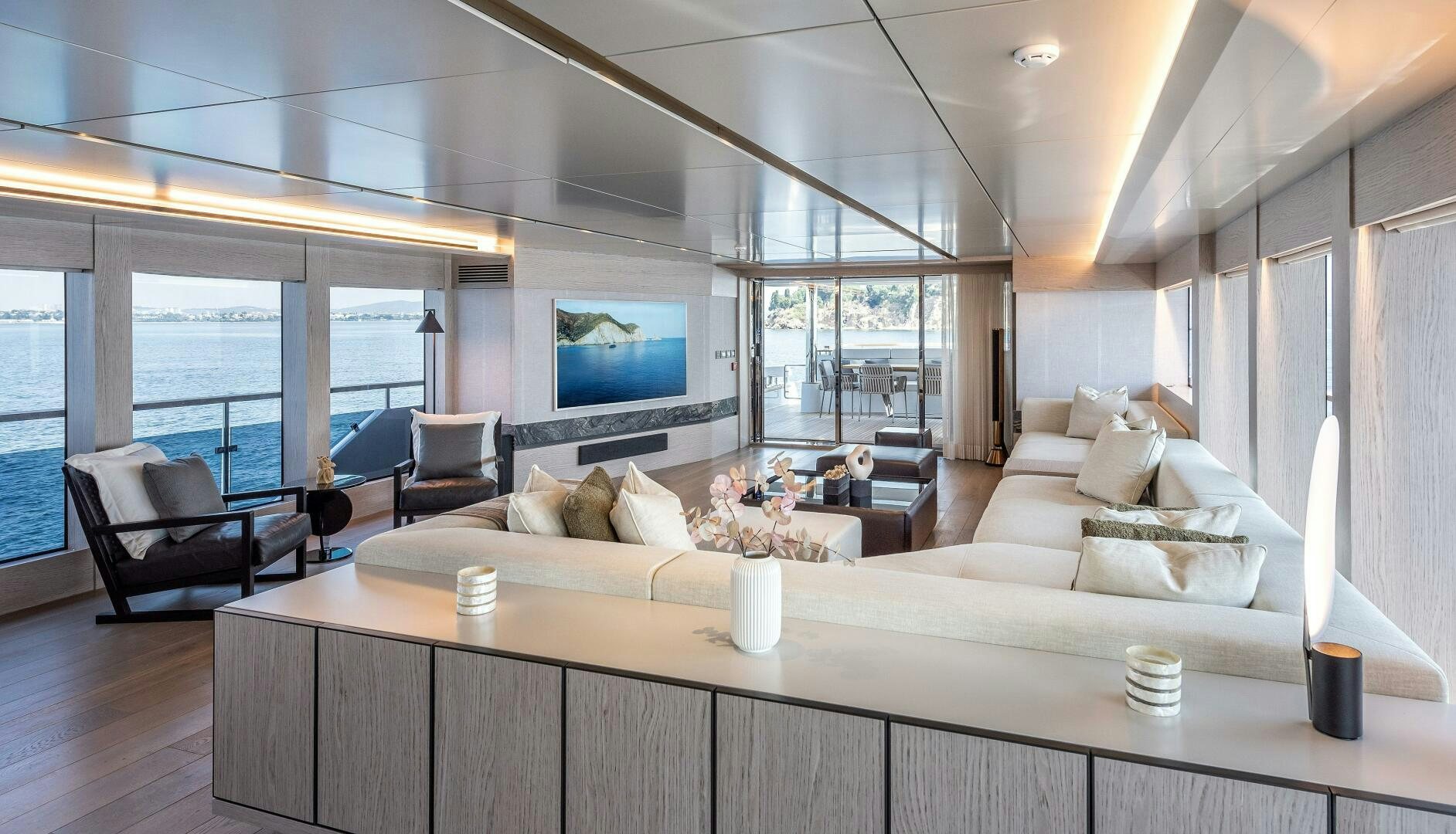 a large living room with a large window aboard 37XP 08 ROCKIT Yacht for Sale
