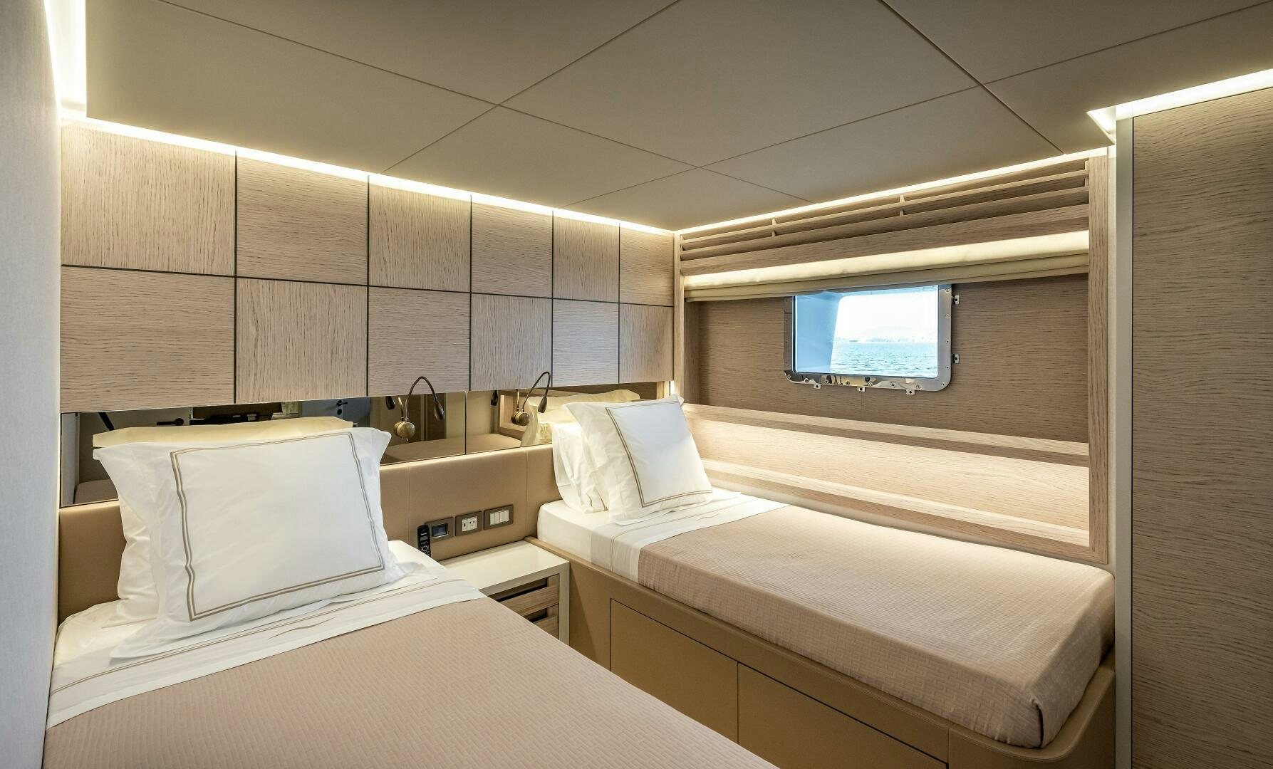 a couple of beds in a room aboard 37XP 08 ROCKIT Yacht for Sale