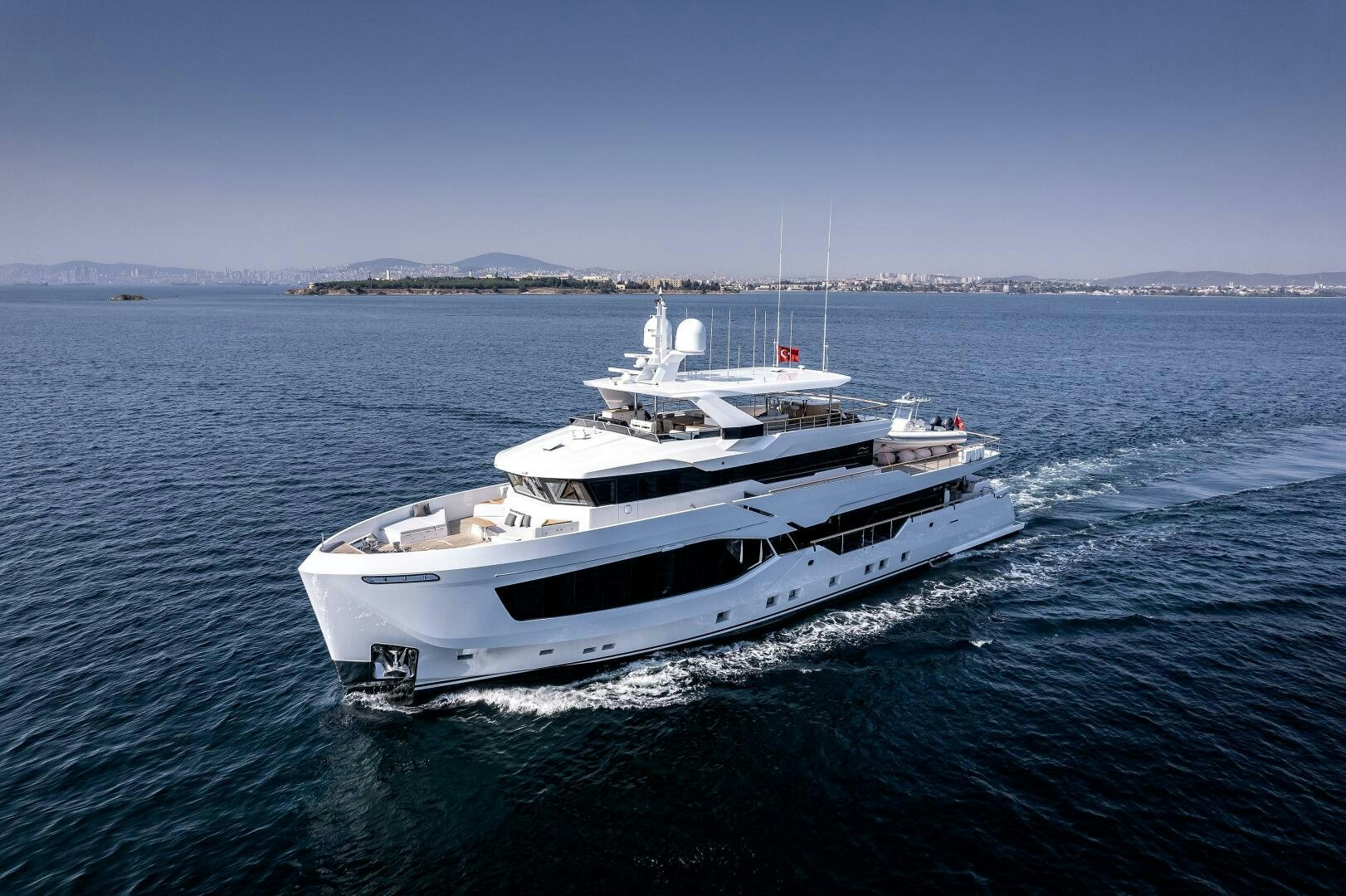 a white yacht in the water aboard 37XP 08 ROCKIT Yacht for Sale