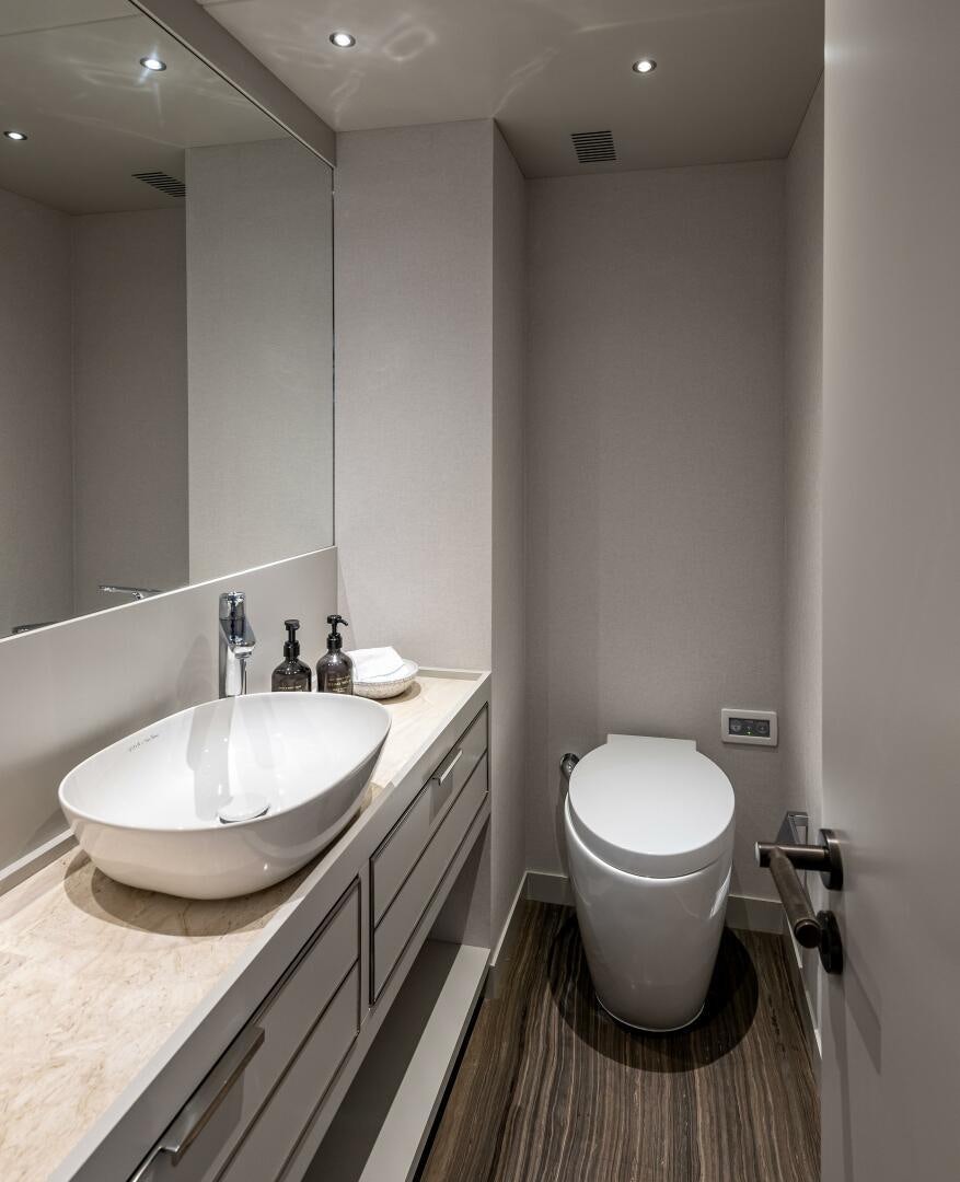 a bathroom with a sink and a toilet aboard 37XP 08 ROCKIT Yacht for Sale