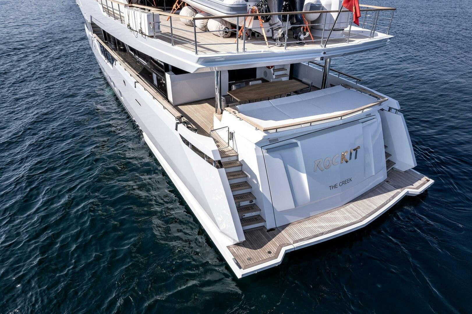 a white boat on the water aboard 37XP 08 ROCKIT Yacht for Sale