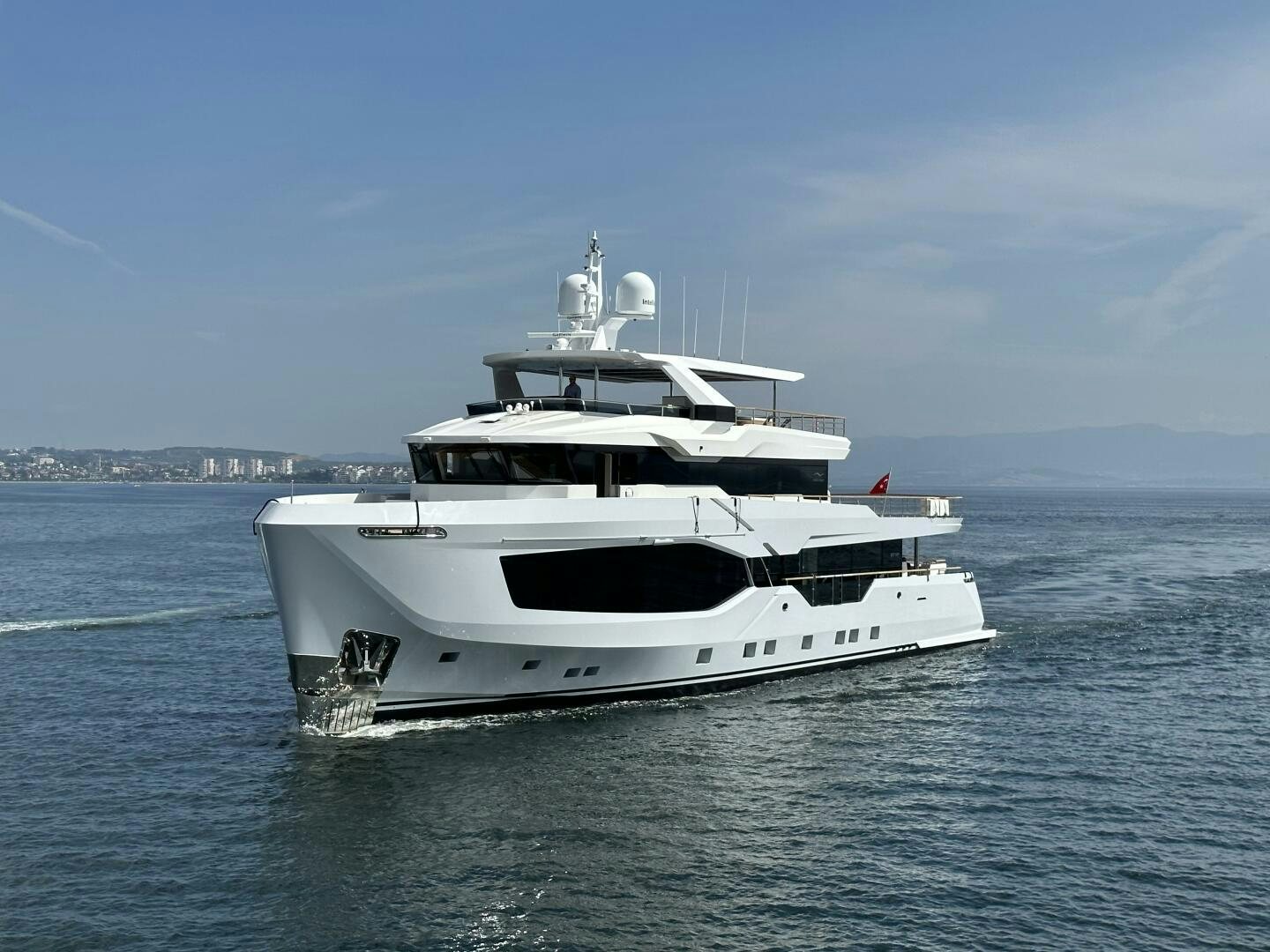 a white yacht in the water aboard 37XP 08 ROCKIT Yacht for Sale