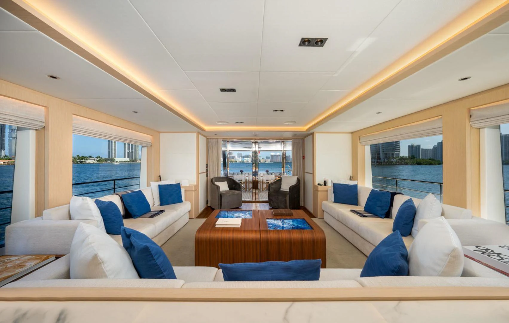 a living room with a large window aboard SANTOSH Yacht for Sale