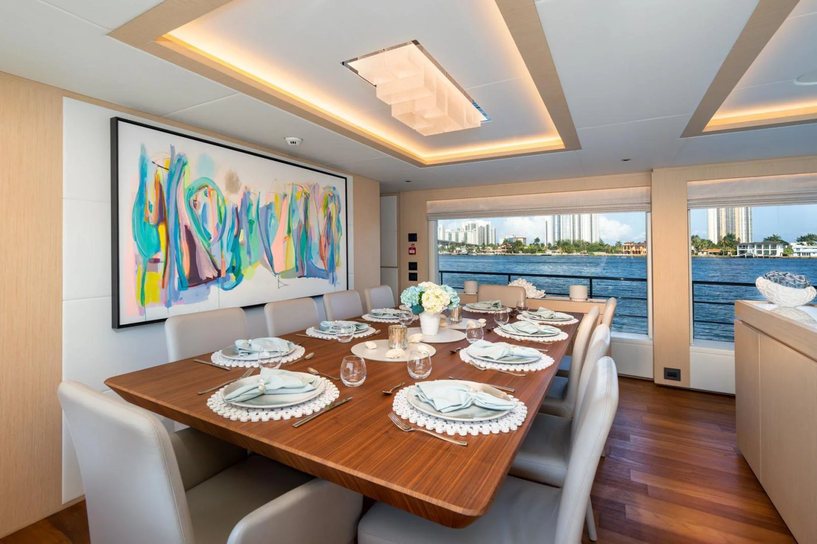a dining table in a kitchen aboard SANTOSH Yacht for Sale