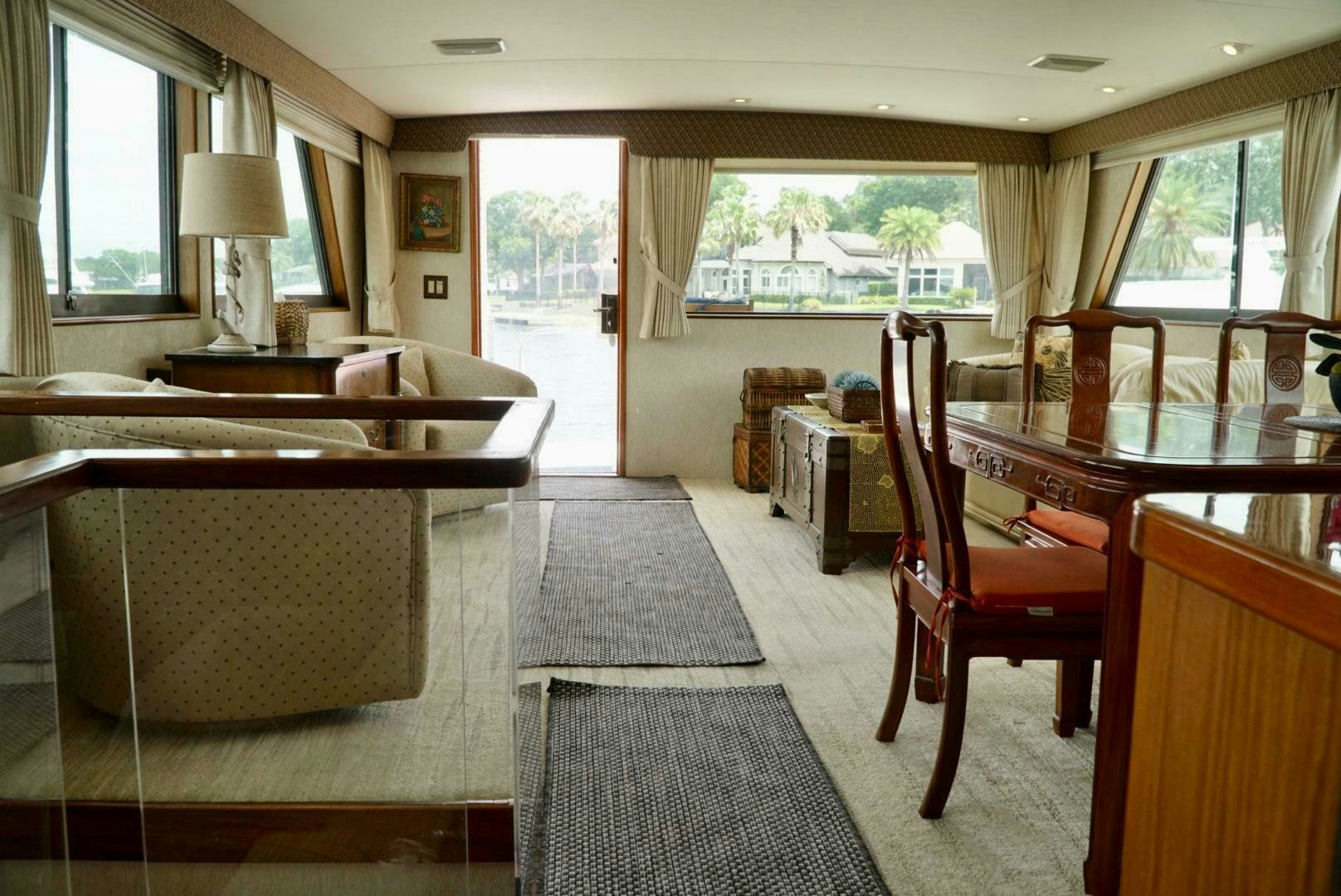a large room with chairs and tables aboard JOIE DE VIE Yacht for Sale