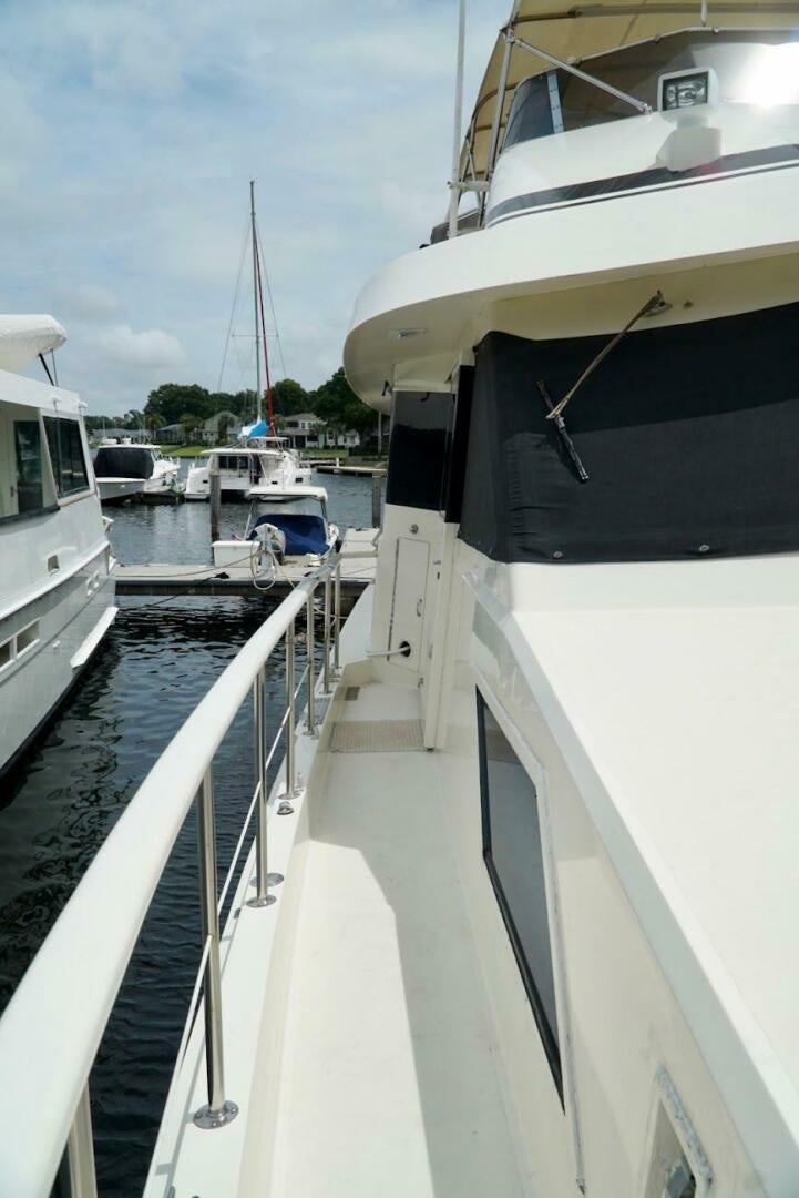 a boat is parked in a harbor aboard JOIE DE VIE Yacht for Sale