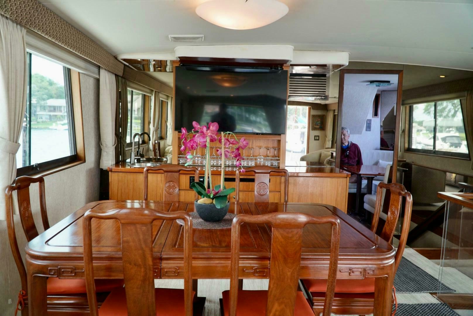a dining table in a kitchen aboard JOIE DE VIE Yacht for Sale