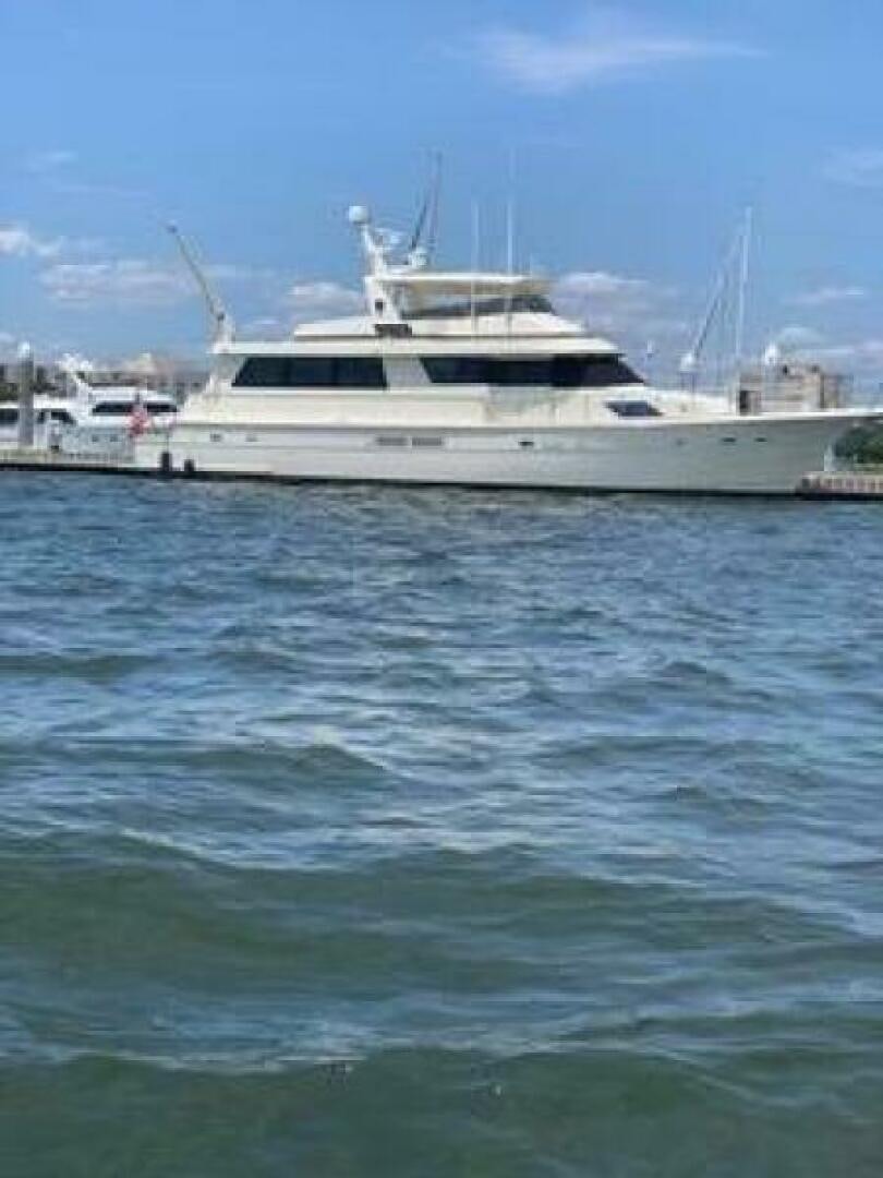 a white boat in the water aboard JOIE DE VIE Yacht for Sale