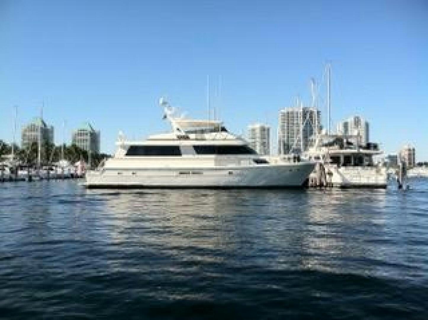 a large white boat in the water aboard JOIE DE VIE Yacht for Sale