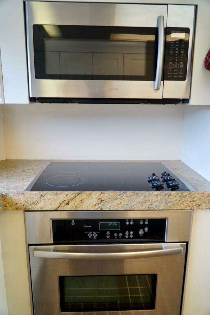 a microwave oven with a stove aboard JOIE DE VIE Yacht for Sale