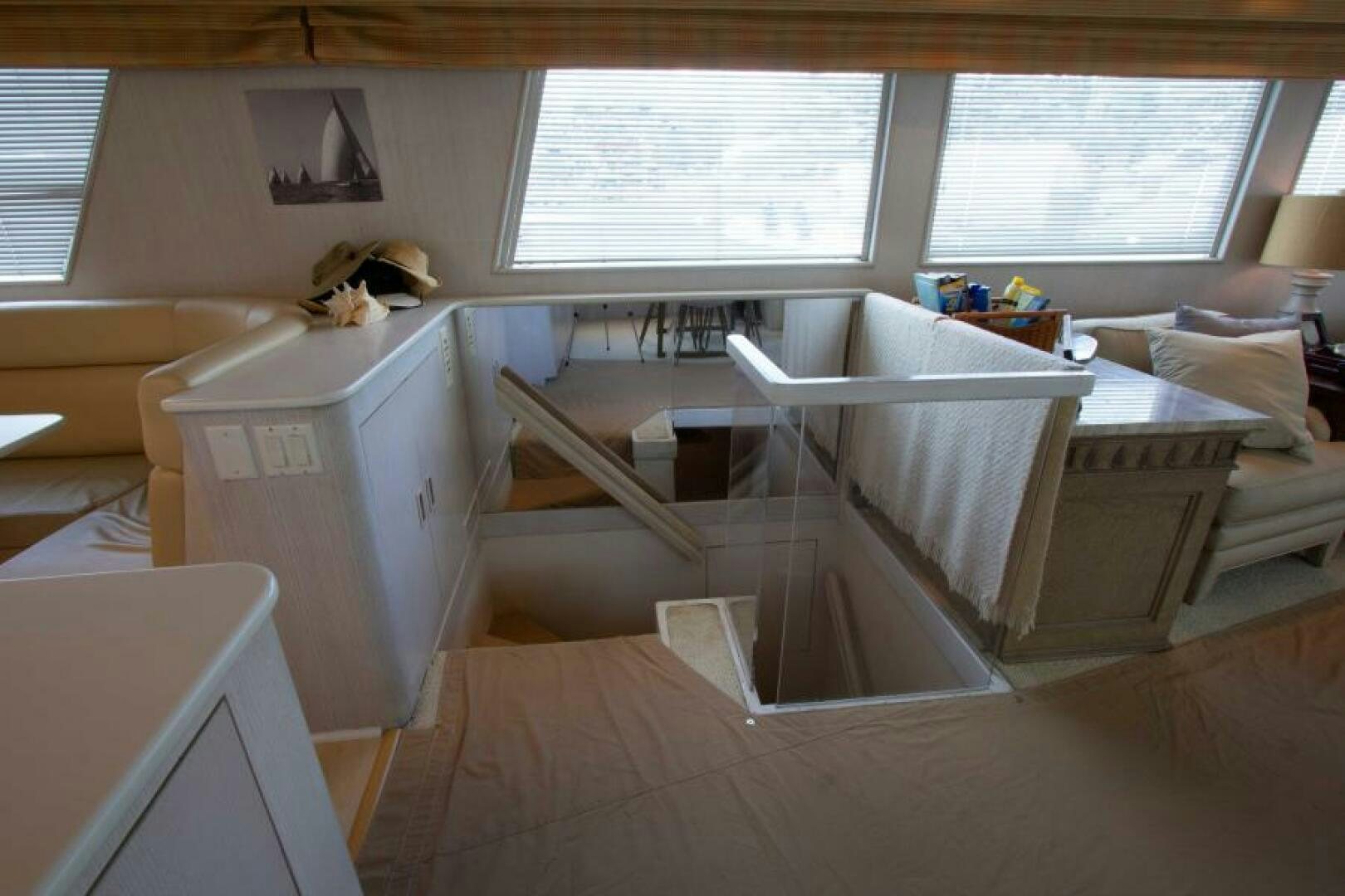a room with a desk and a computer aboard FULL MOON Yacht for Sale