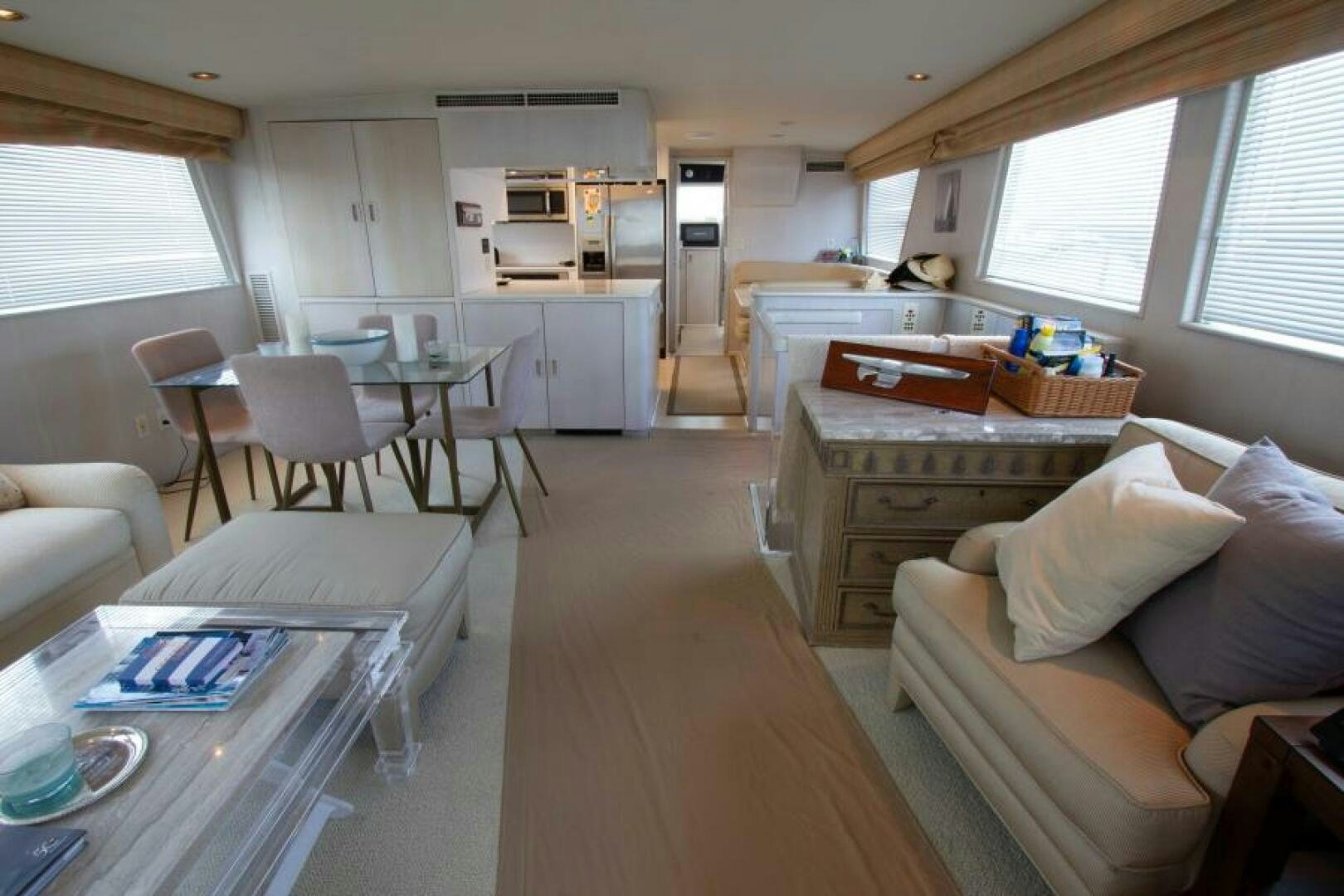 a living room with a couch and a table aboard FULL MOON Yacht for Sale