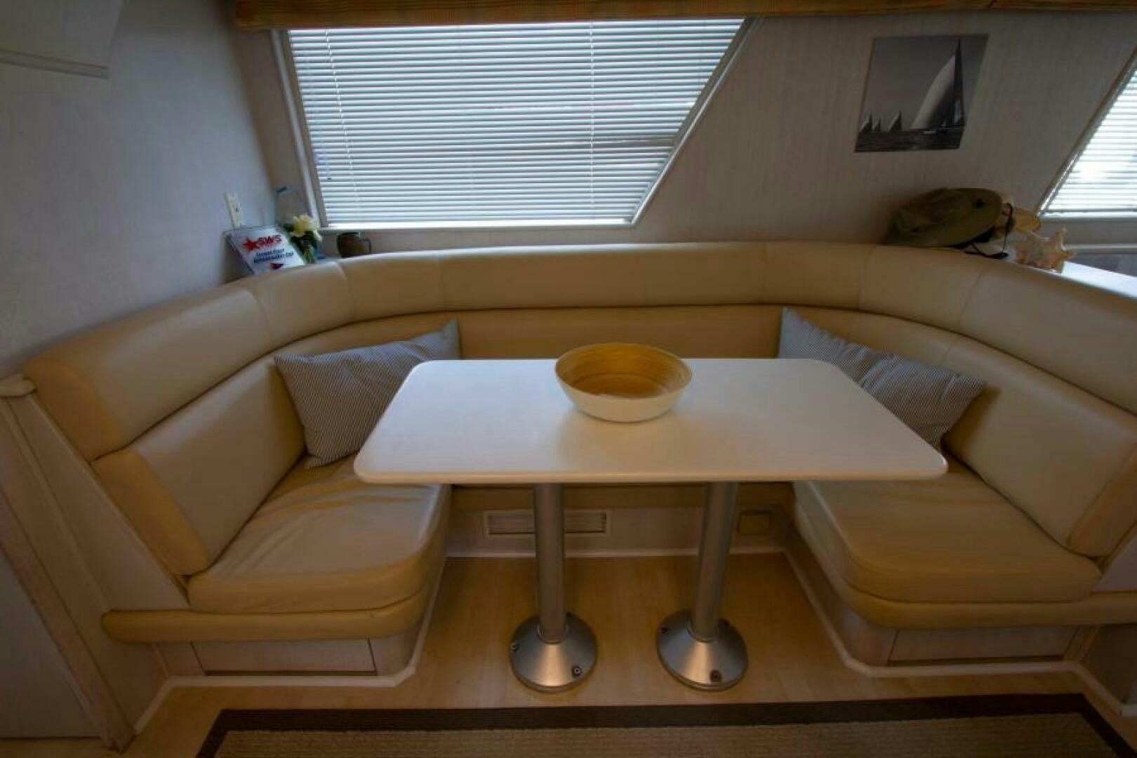 a table with a plate on it aboard FULL MOON Yacht for Sale