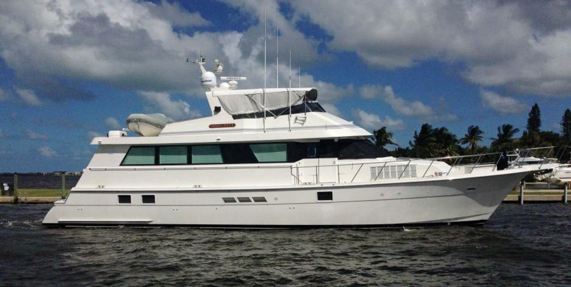a white yacht on the water aboard FULL MOON Yacht for Sale