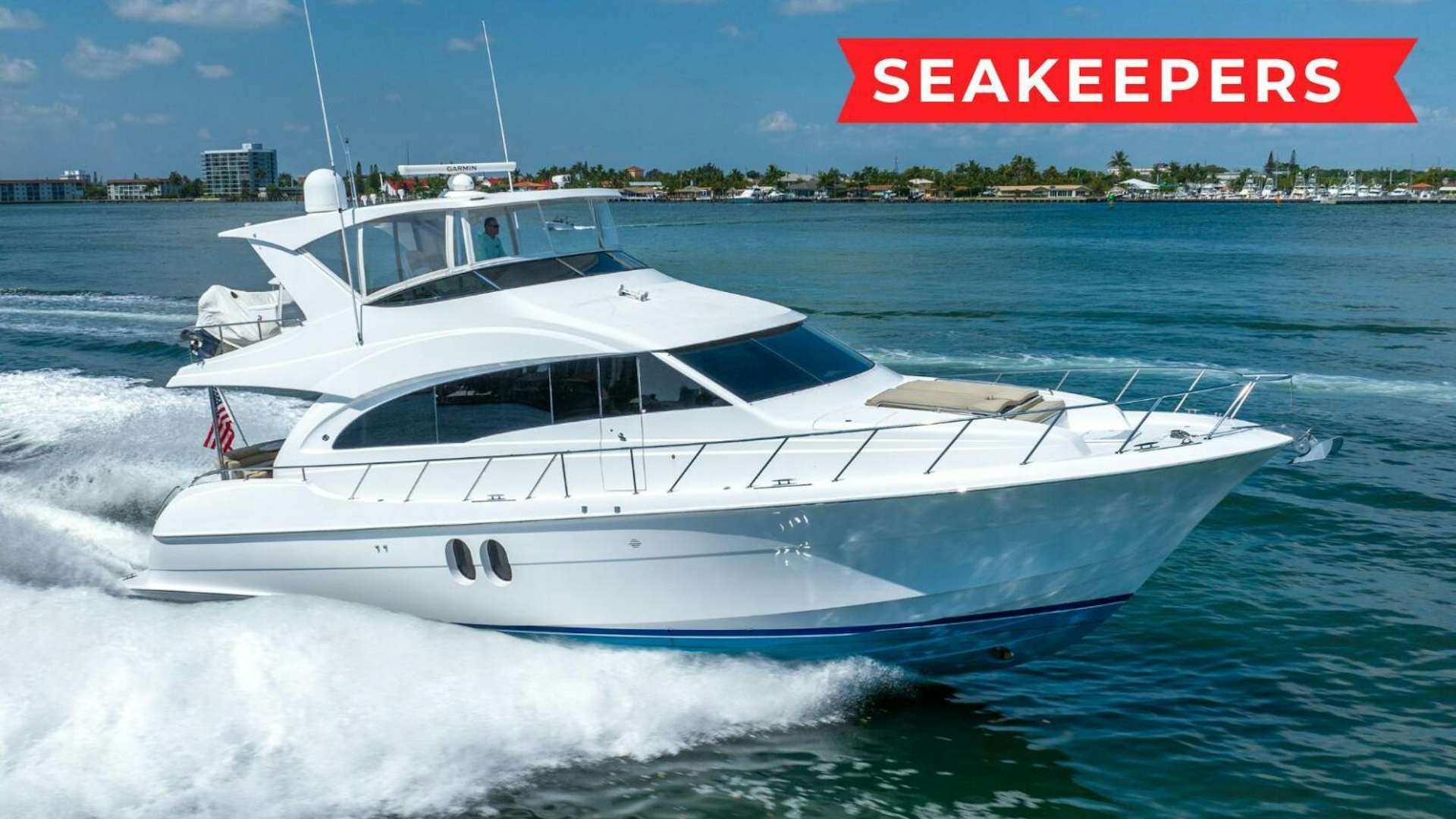 a white yacht on water aboard 'S NOW OR NEVER Yacht for Sale