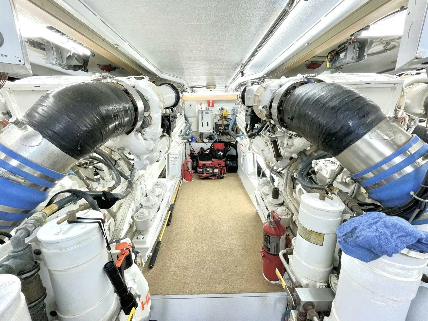 a car with a large engine aboard BOATOX Yacht for Sale