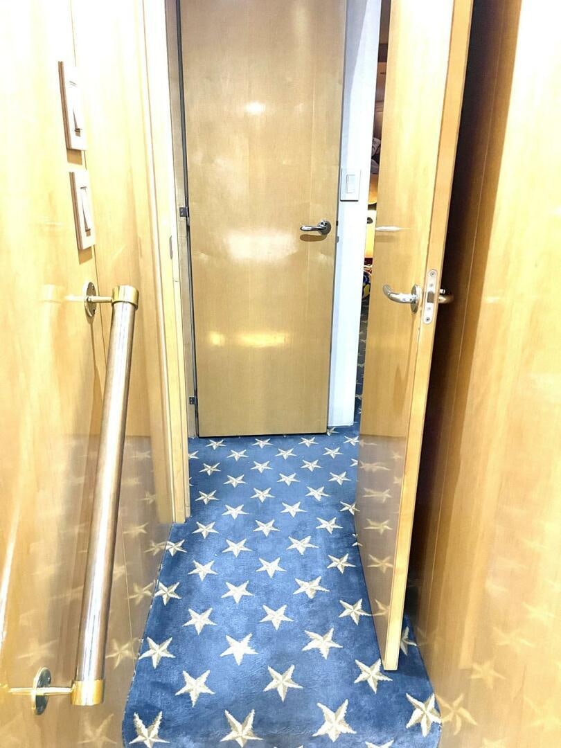a flag on a door aboard BOATOX Yacht for Sale