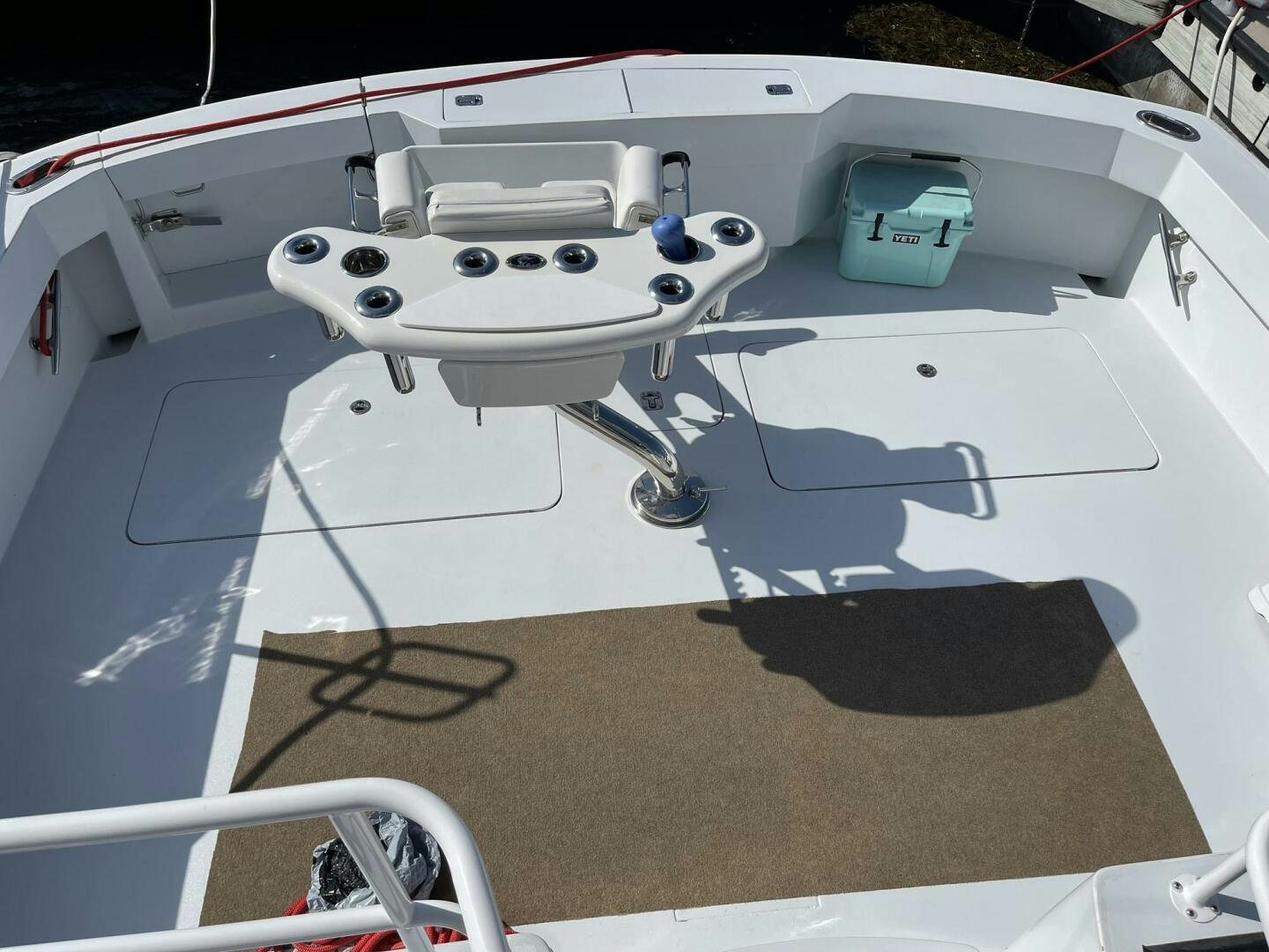 a white drone on a white surface aboard BOATOX Yacht for Sale