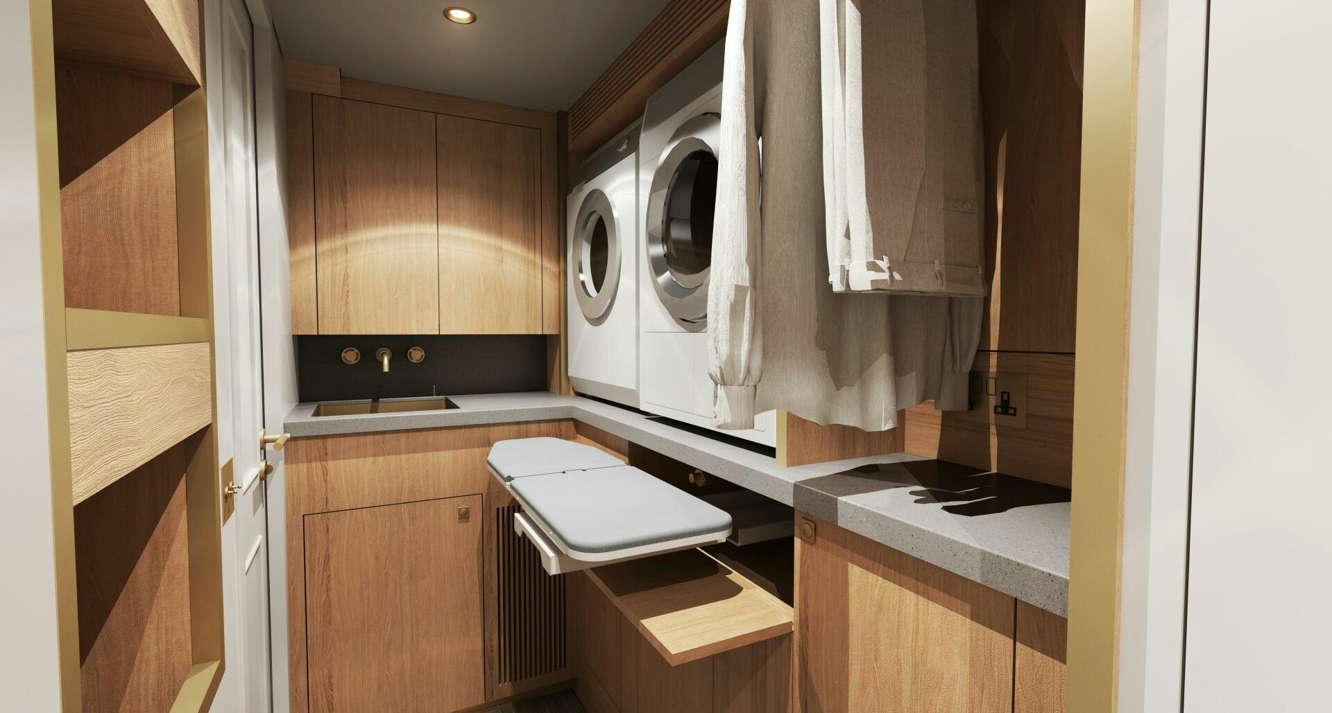 a kitchen with a washing machine aboard PROJECT OCEAN Yacht for Sale