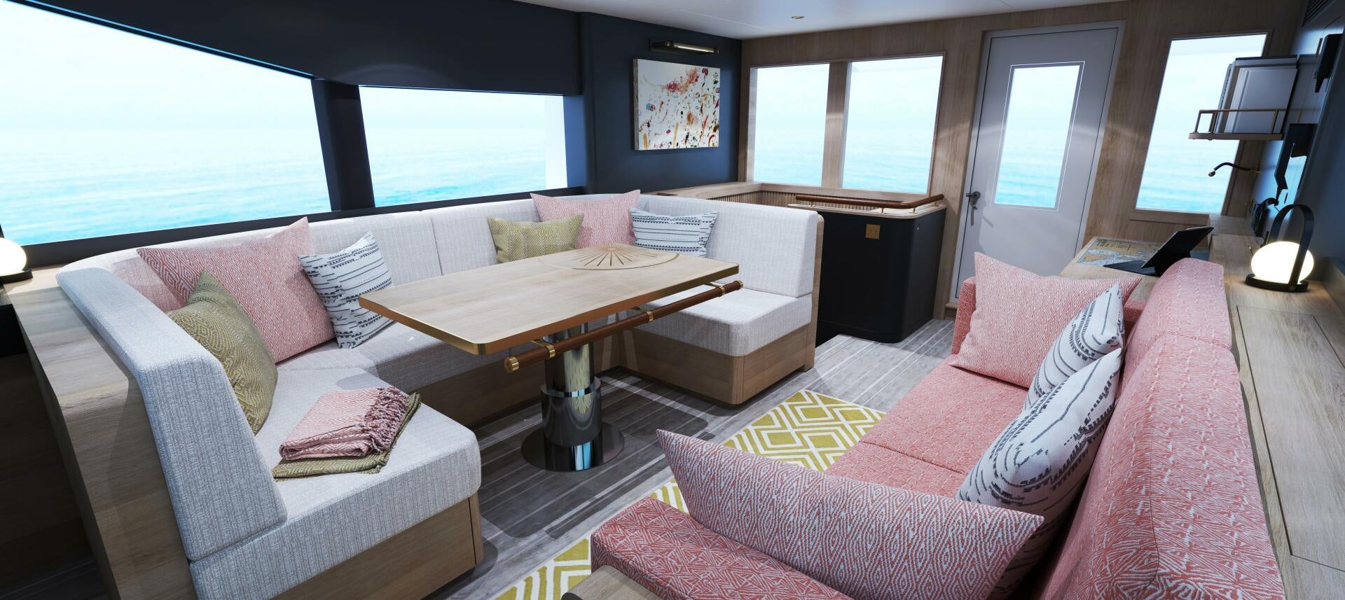 a living room with a couch and a table aboard PROJECT OCEAN Yacht for Sale