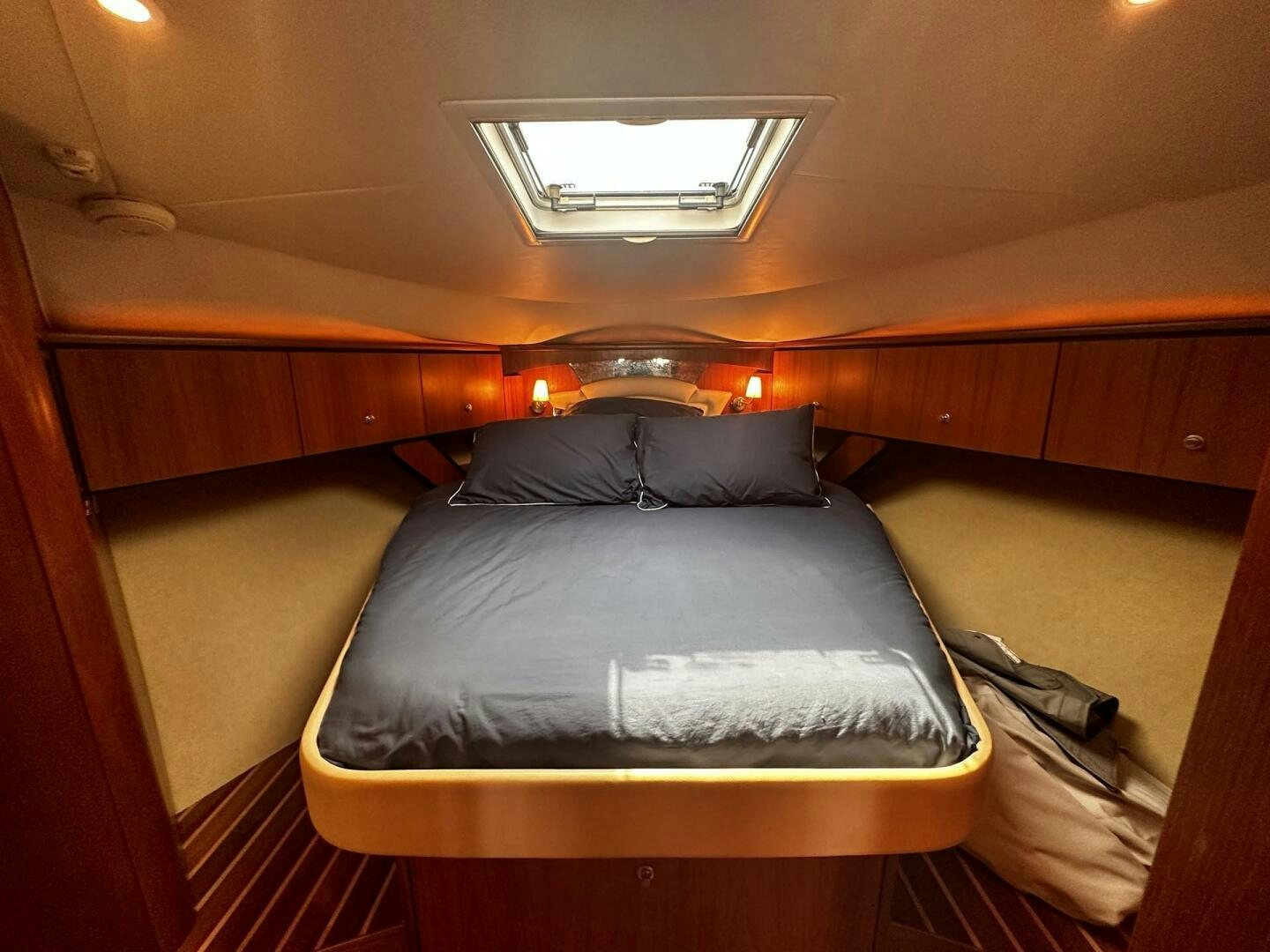 a bed in a cabin aboard CRYSTAL II Yacht for Sale