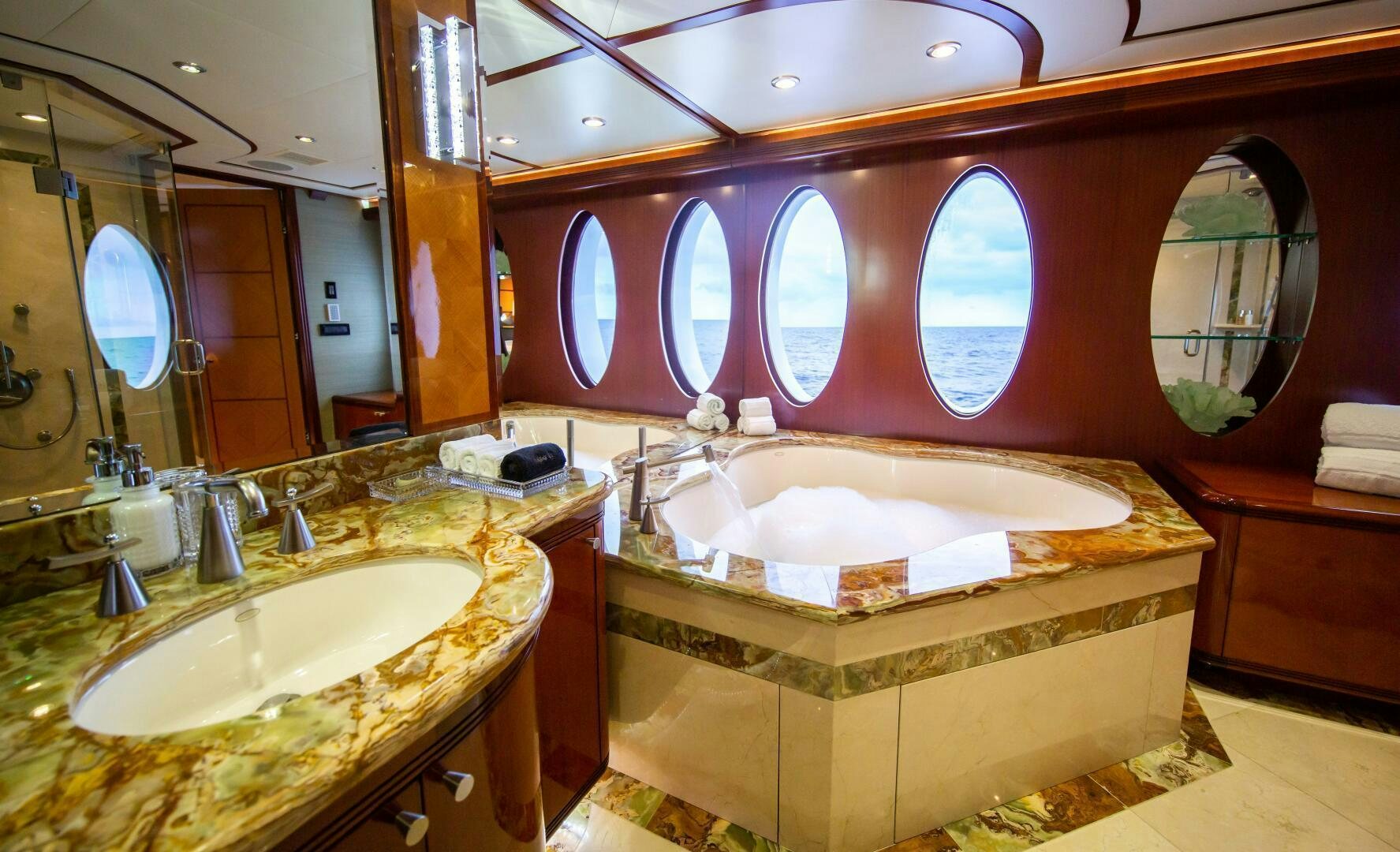 a bathroom with a large tub aboard JUST ENOUGH Yacht for Sale