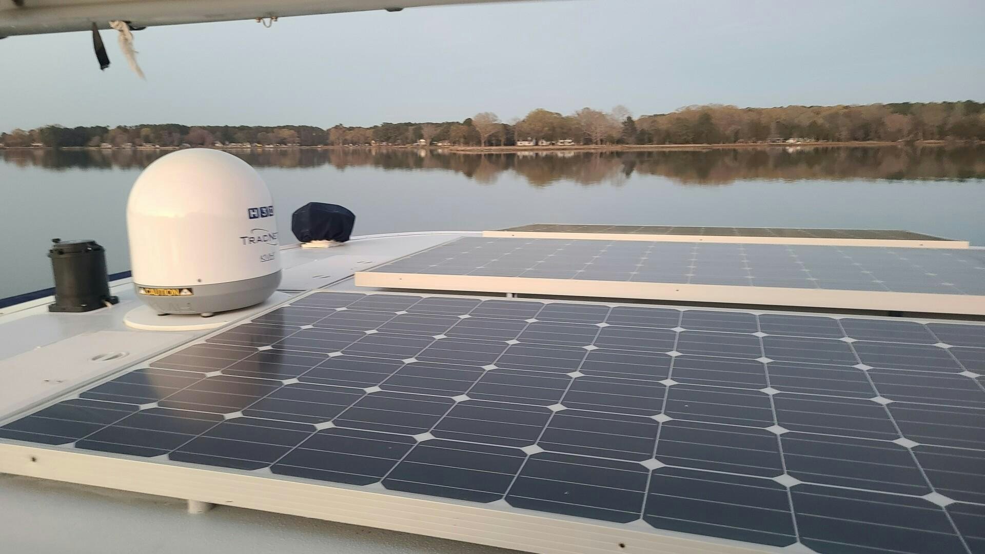 a solar panel with a white lamp on top of it aboard SOVEREIGN Yacht for Sale