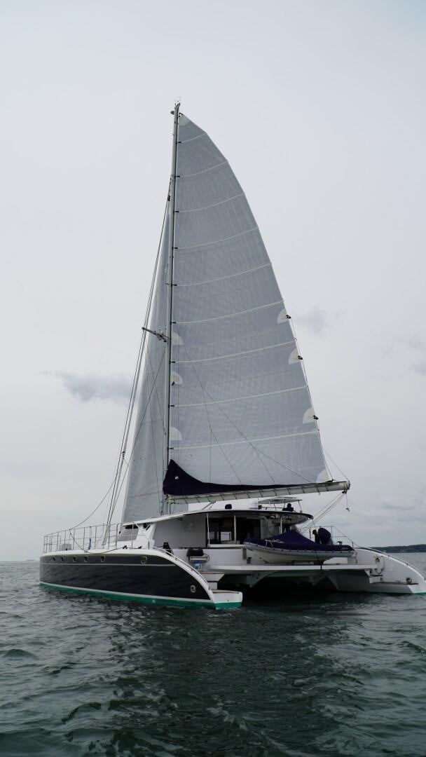 a sailboat on the water aboard SOVEREIGN Yacht for Sale