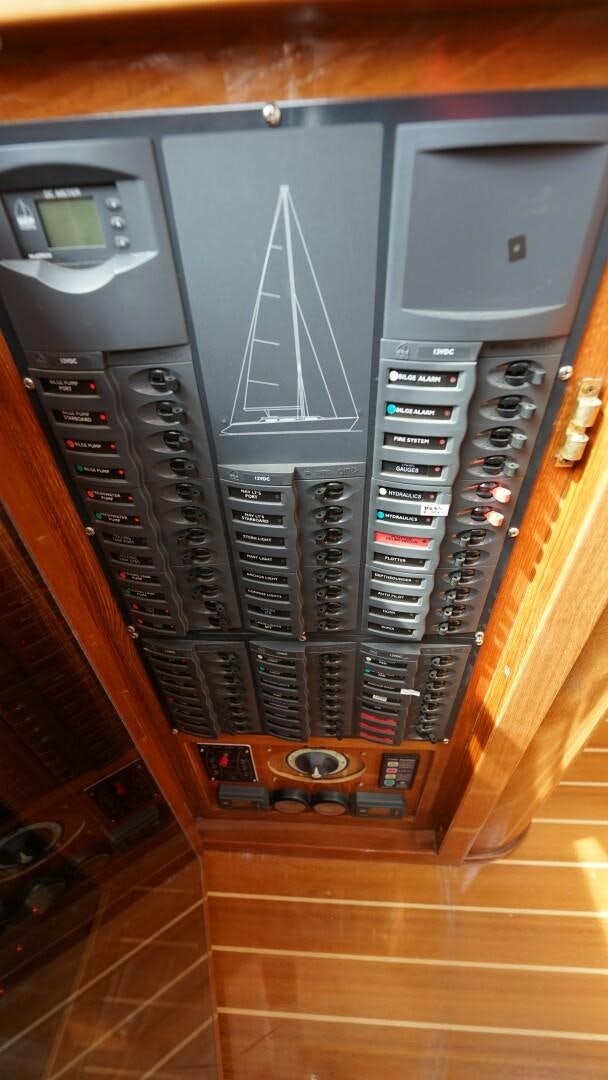 a computer tower with a screen aboard SOVEREIGN Yacht for Sale