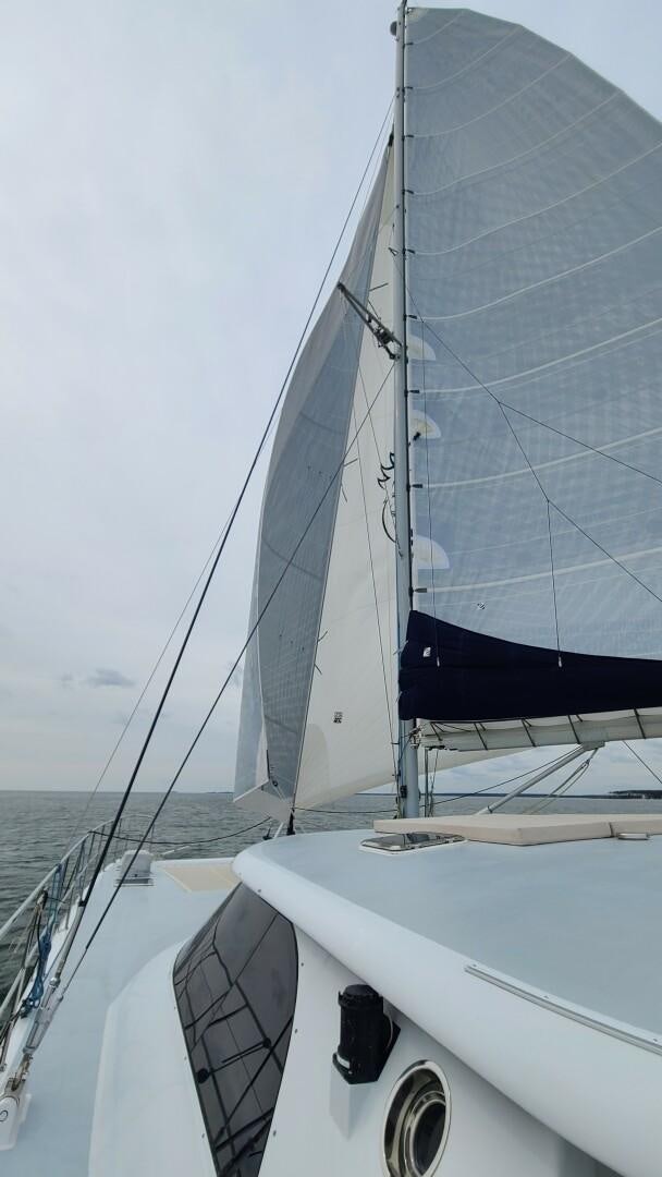 a sailboat on the water aboard SOVEREIGN Yacht for Sale