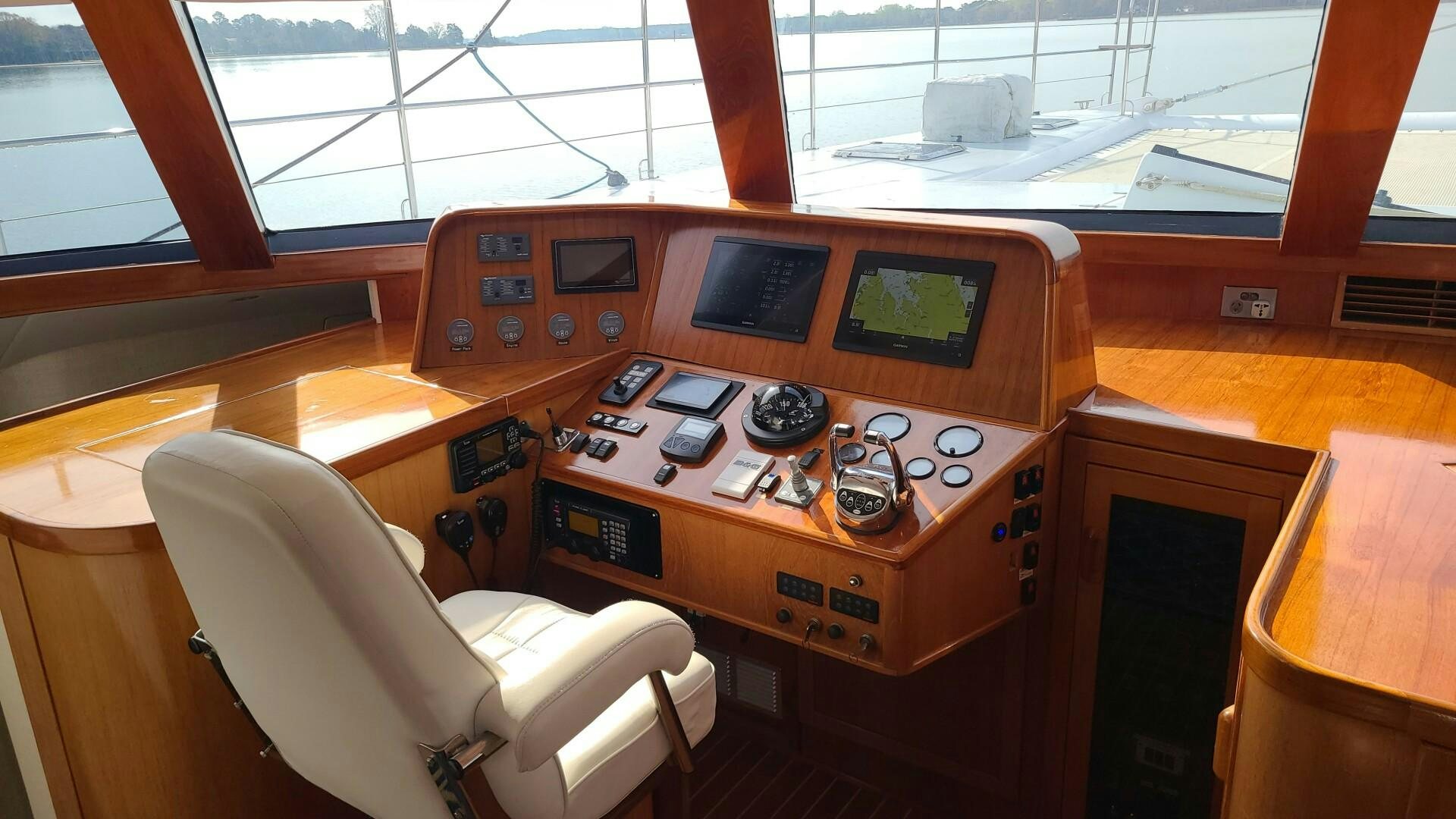 a room with a desk and a chair aboard SOVEREIGN Yacht for Sale