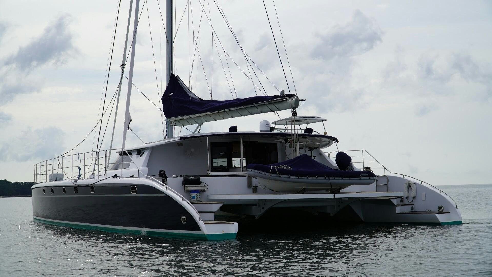 a couple of boats on the water aboard SOVEREIGN Yacht for Sale