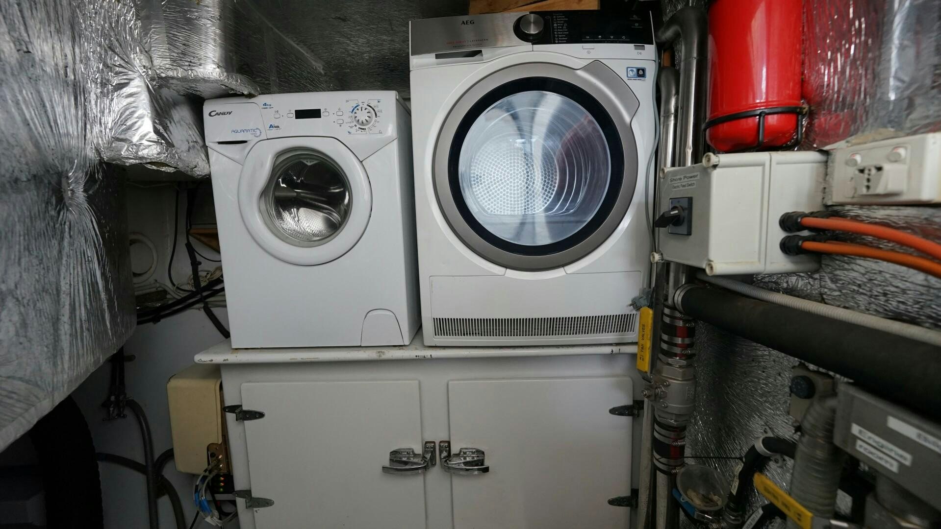 a white washing machine aboard SOVEREIGN Yacht for Sale