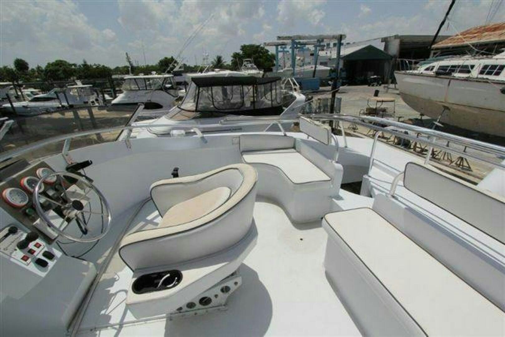 a group of boats are parked in a harbor aboard PRICELESS Yacht for Sale