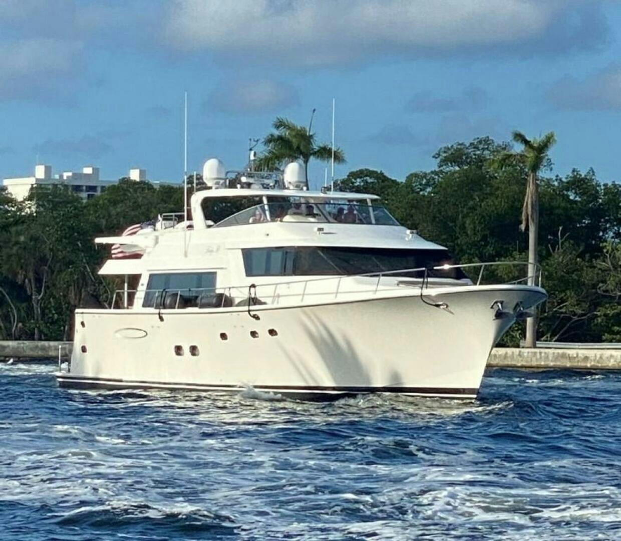 a white yacht in the water aboard LADY B Yacht for Sale